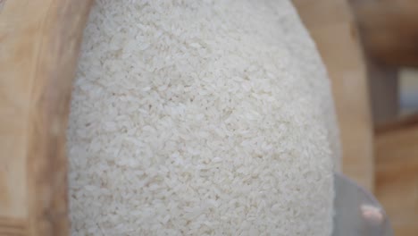 white rice in wooden bowl