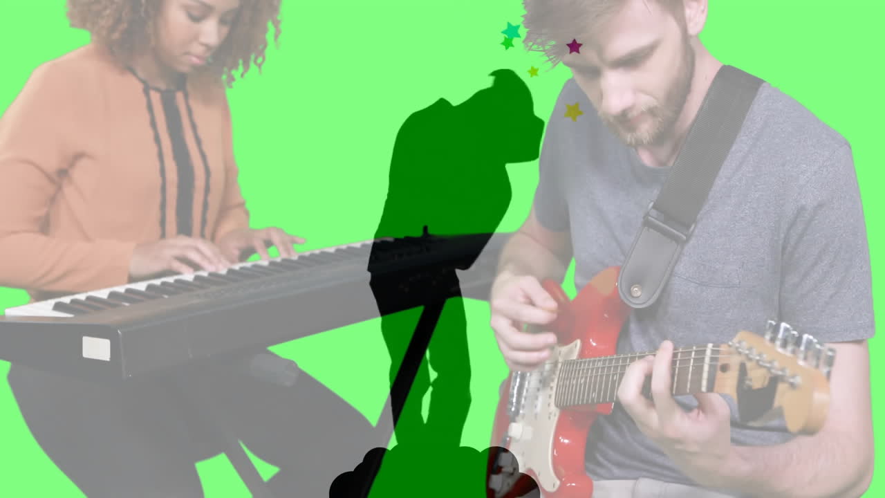 Woman keyboardist and man guitarist performing music in studio, neon LED bars animating background