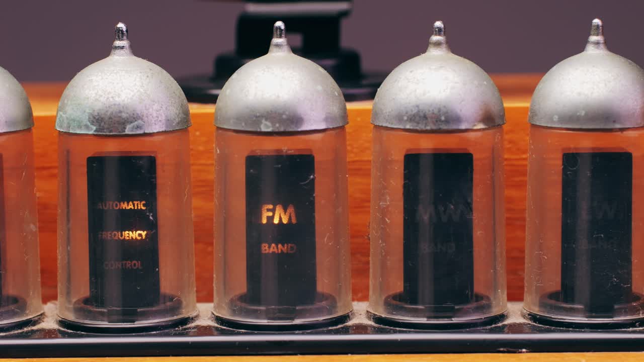 Old Retro AM FM Radio with tubes, Hand Changing stations , bulb vintage music player.