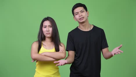 young asian couple being angry together