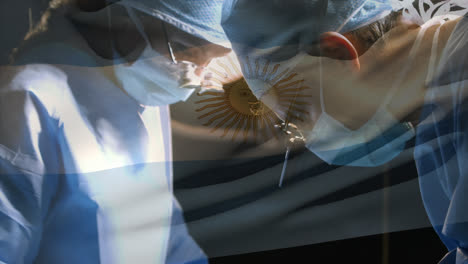 animación de la bandera de argentina sobre los cirujanos en el quirófano