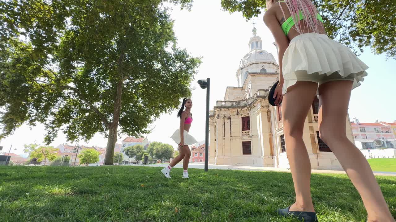 Women Exercising in a Park