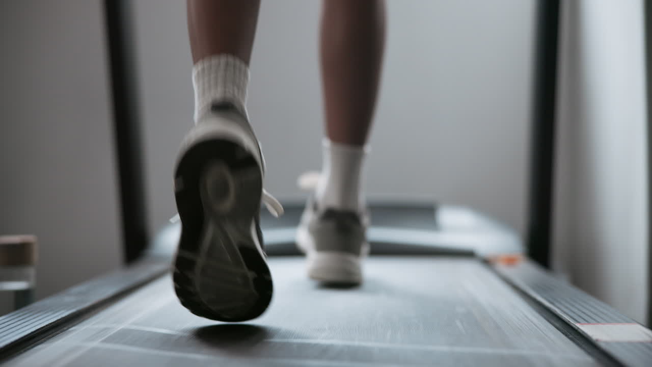 Person exercising on a treadmill