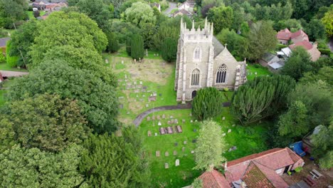 Aerial-video-footage-of-the-remains-of-Bolingbroke-Castle-a-13th-century-hexagonal-castle,-birthplace-of-the-future-King-Henry-IV,-with-adjacent-earthwork