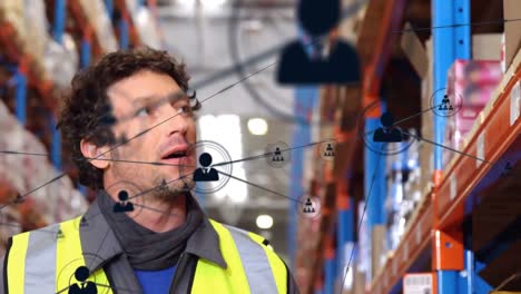 Animation-of-network-of-connections-over-man-working-in-warehouse