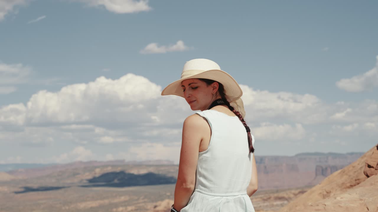 Enjoy the stunning view of Arches National Park in Utah through the eyes of a young woman as she stands in awe, gazing out over the breathtaking valley.

Shot in 4K with Sony A7S III and Dji RS2.