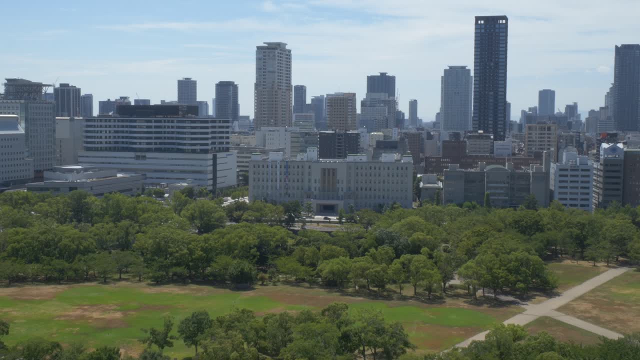 City Background From Nishinomaru Garden In Osaka Castle Park In Osaka, Japan. Aerial Shot