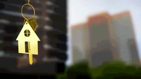 animation of gold house key fob and key, hanging in front of blurred city high rise buildings