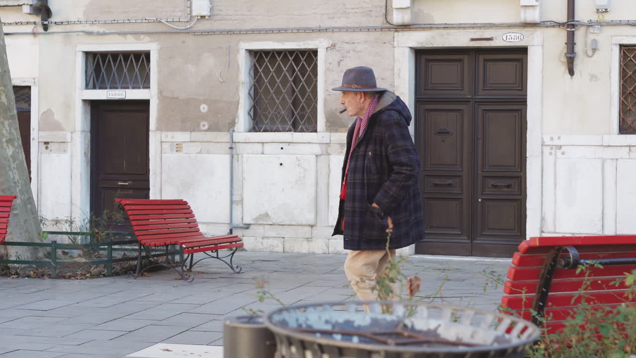 Man walking in Venetian Plaza