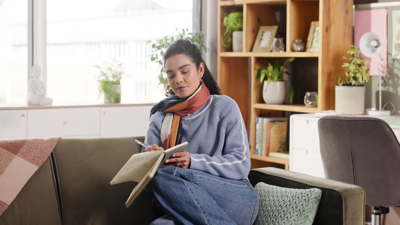 Woman journaling at home