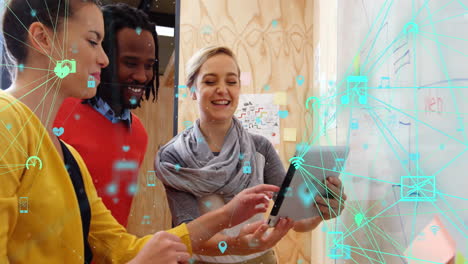 Animation of network of connections with icons over diverse business people at office