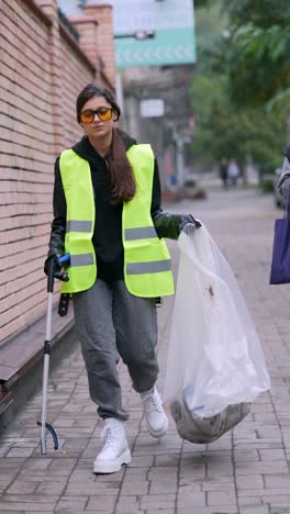 woman cleaning up city streets