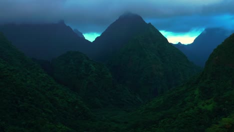 cloudy morning towering jagged mountain peaks vallee de tautira river tahiti island french polynesia aerial drone valley bay teahupoo mont rauiri aorai taiarapu taravao forward pan up parallax motion