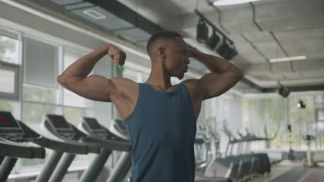 athletic african american man in the gym.