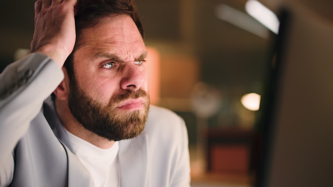 A worried man thinking about something