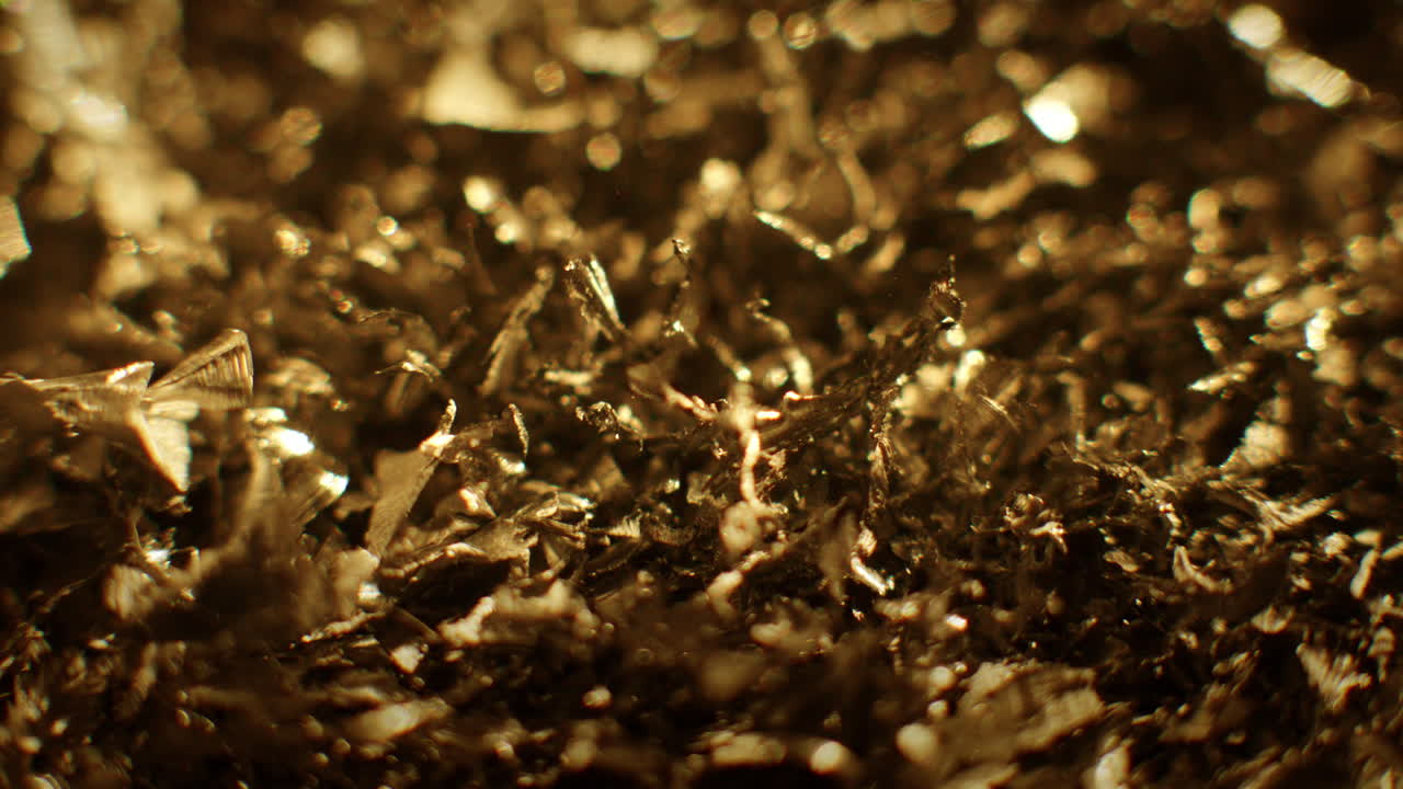 Golden color metal fillings chaotic movement