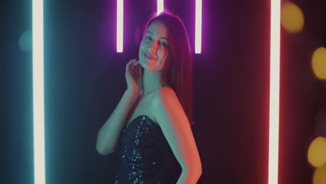 stylish woman in neon lights