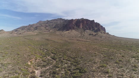 aerial - drone zoom in of desert mountain