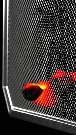 burning flame on metal grill