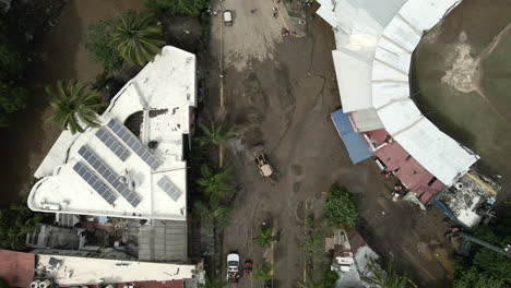 Loader-At-Work-Clearing-Mud-And-Debris-Left-By-Hurricane-Roslyn-In-Sayulita-Beach-In-Mexico