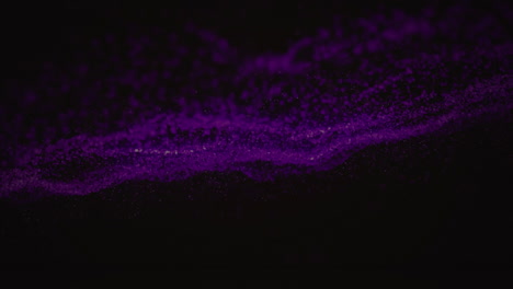 animation of purple wave of spots on black background