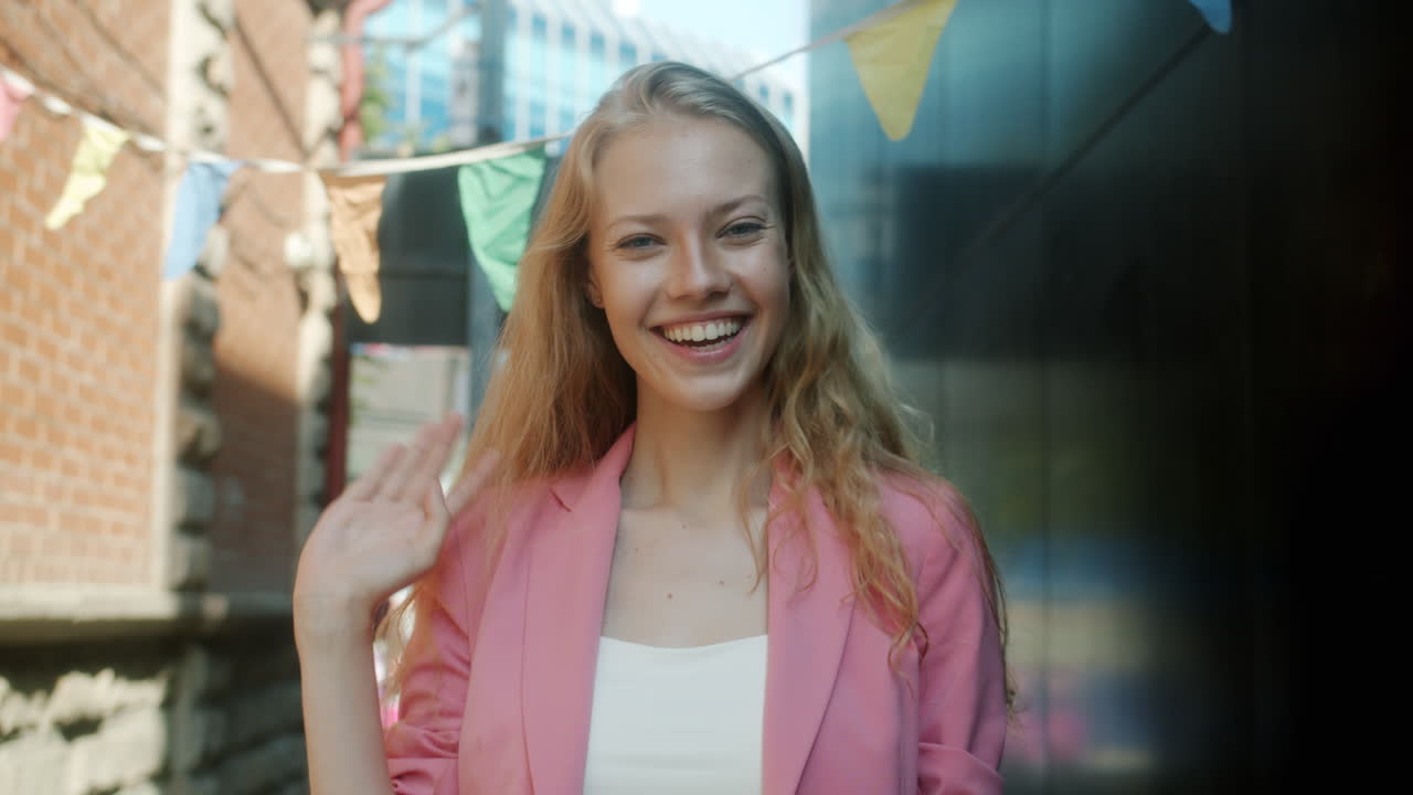 Happy Woman in Pink Blazer Outdoors