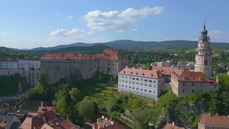 Beautiful-aerial-top-view-flight-Krumlov-castle-on-the-hill-castlein-in-czech-republic-Cesky-in-Europe,-summer-of-2023