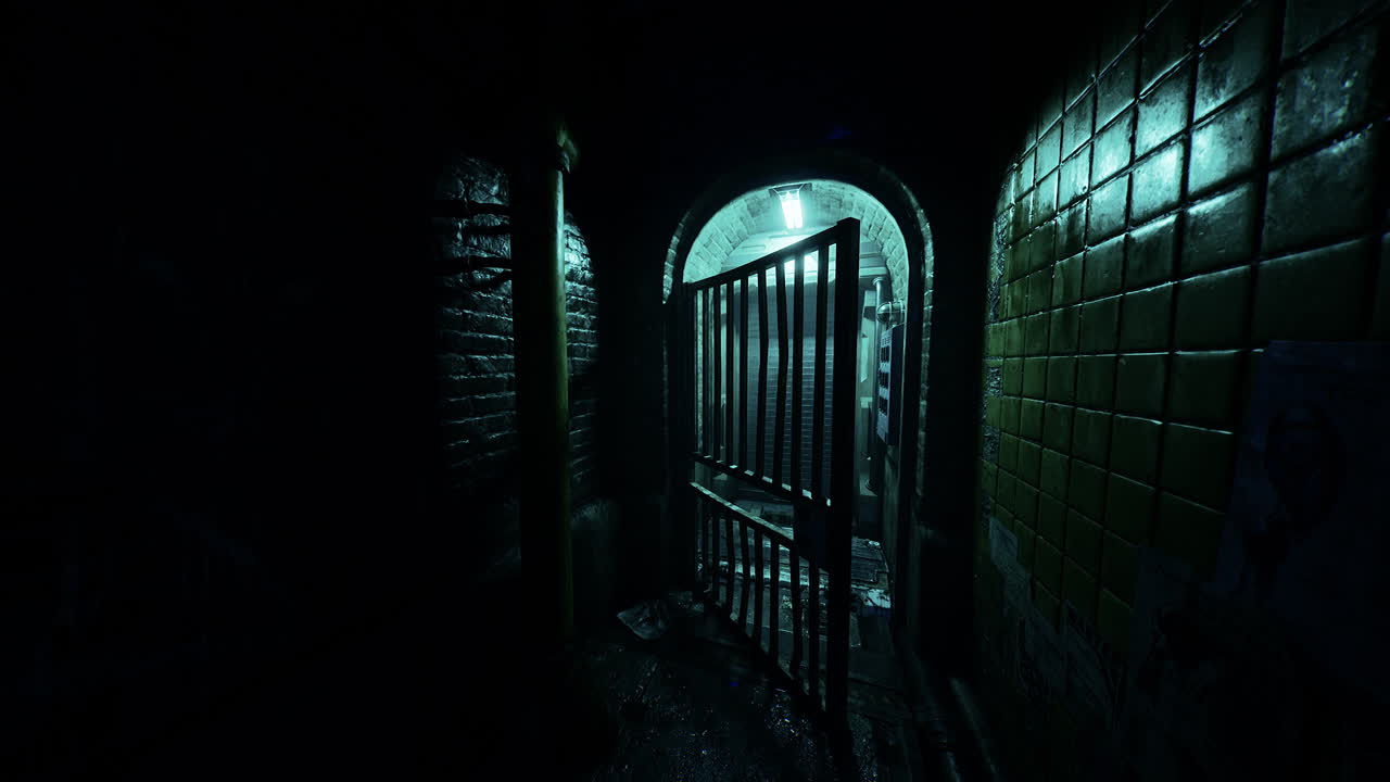 Dark alley with gate and brick walls