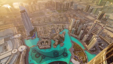 sunlight el edificio más alto del mundo centro comercial techo de la fuente vista superior 4k lapso de tiempo emiratos árabes unidos