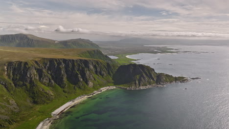 stave norway aerial v16 breathtaking view flyover above måtind mountain overlooking at beautiful høyvika bay, coastal cliff terrain and rocky mountainscape - shot with mavic 3 cine - june 2022