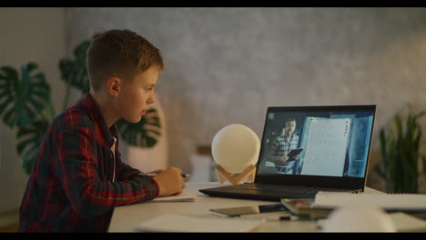 boy taking an online math class