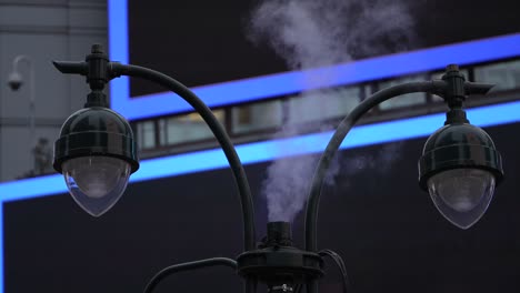 steam coming out of lamp post in new york city - street light smoking in nyc