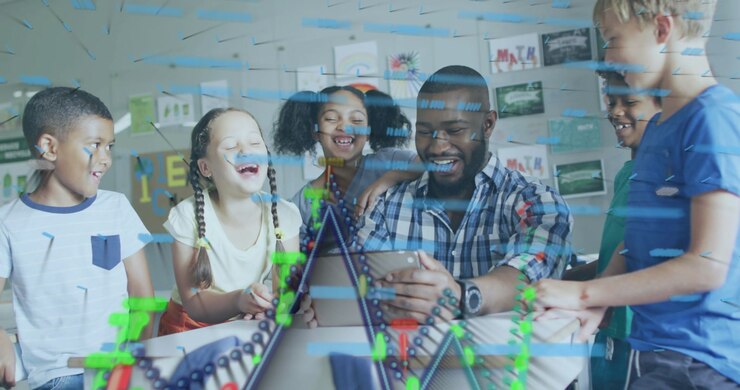 Male teacher in plaid shirt showing tablet while school kids leaning in class watching track model