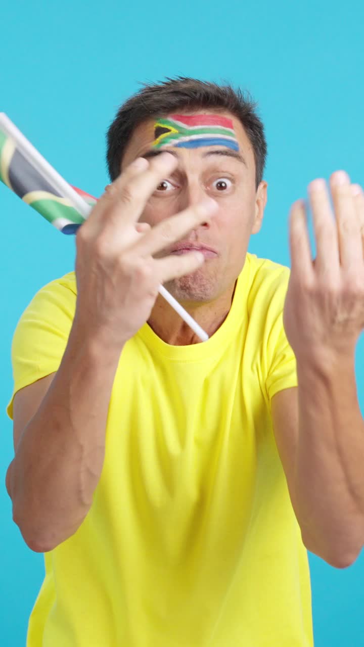 Man Cheering for South Africa, angry with the decision of referee