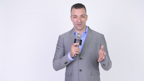 portrait of businessman wearing suit isolated against white background