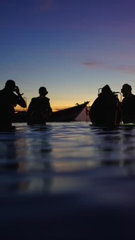 Scuba Divers at Sunset