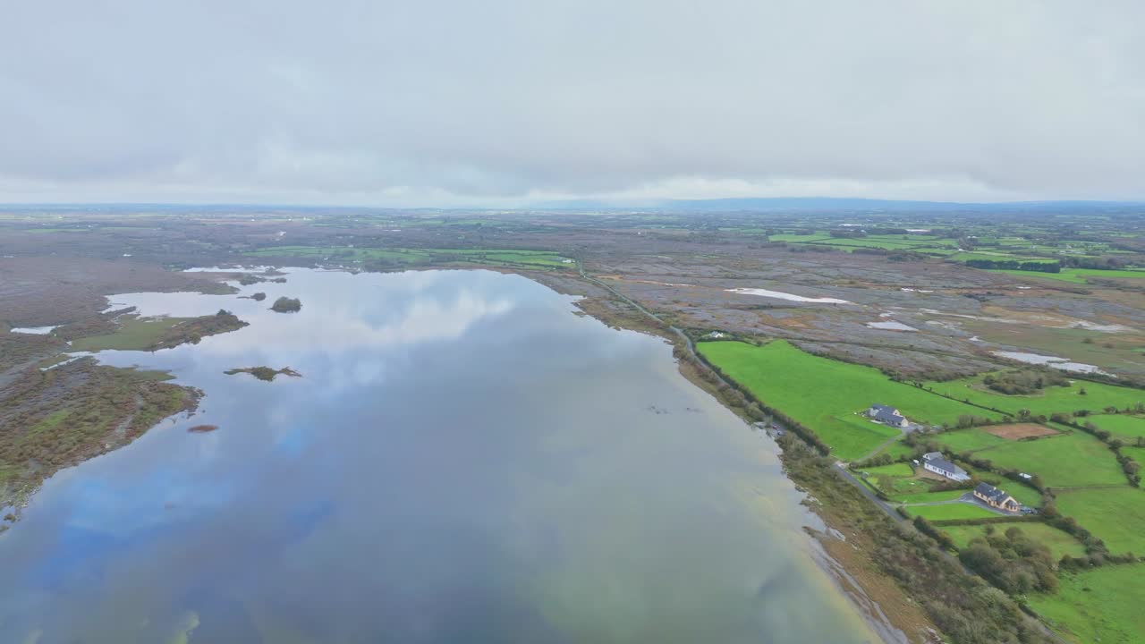 A River In Green Fields In The Countryside Village In Burren, Ireland. Aerial Drone Shot