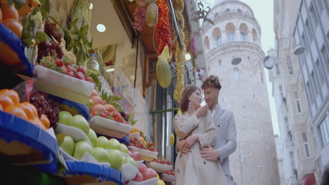 couple at a fruit market in istanbul