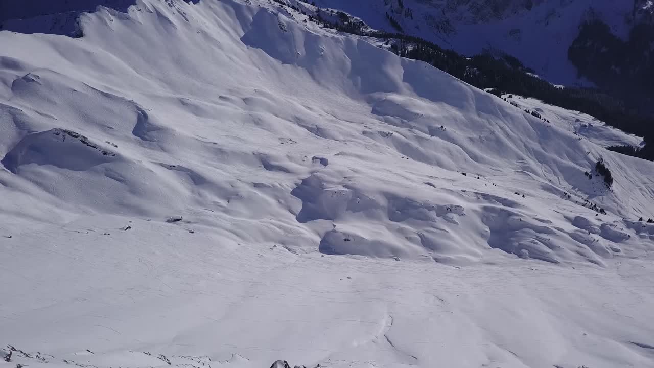 Pan Down Over Snow Covered Hill