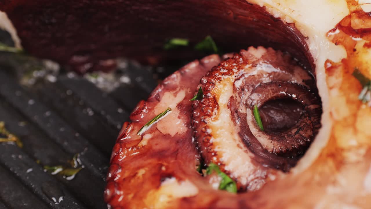 Octopus cooking, chef grill fresh octopus galician style on restaurant kitchen, healthy food, seafood cafe in spain, traditional asian japanese spanish and mediterranean dish.