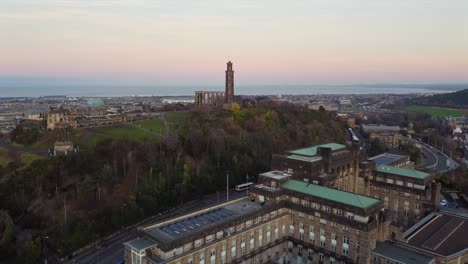 aerial view of calton hill in edinburgh, scotland at sunset