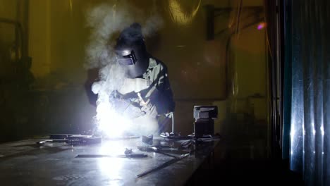 Welder-welding-a-metal