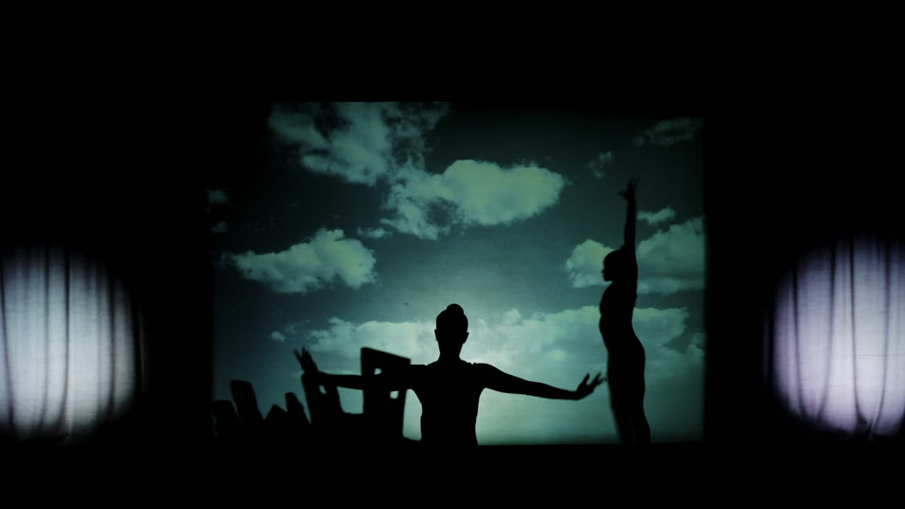 Silhouette Cityscape and Stage Performance