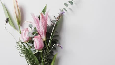 Video-of-bunch-of-multi-coloured-flowers-and-copy-space-on-white-background