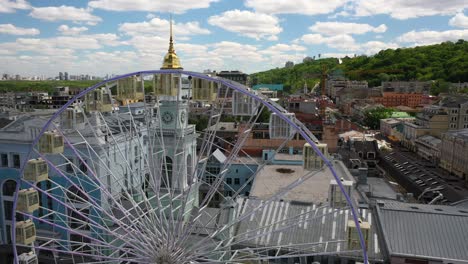 aerial view of ferris wheel and cityscape in lviv, ukraine