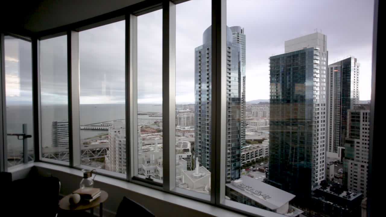 Cityscape View from a High-Rise Window