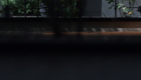 confident man running city street in suit. male legs in black shoes closeup.