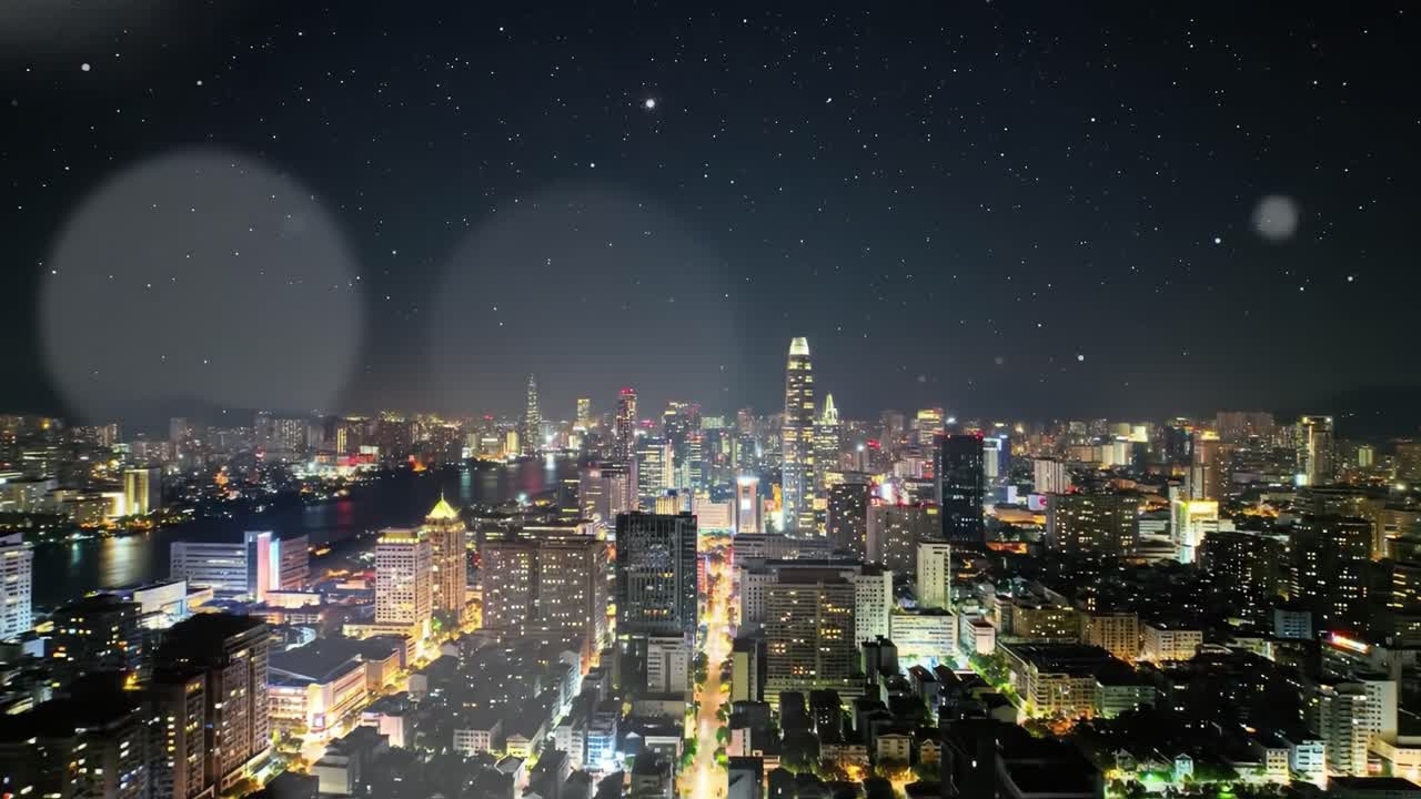 Stunning Nighttime Cityscape: A Breathtaking View of a Vibrant Urban Skyline Illuminated by Twinkling Stars and Vibrant Lights Reflecting on Water