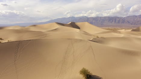 aerial drone footage of the sand dunes in death valley, california, usa