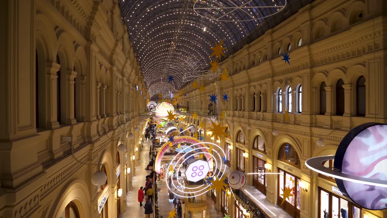 Discover the stunning architecture of Moscow's GUM department store as it comes alive with vibrant decorations and festive lights, showcasing its historical significance and beauty.